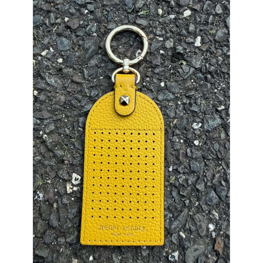 Henri Bendel Yellow Pebbled Leather Perforated Striped Keychain Bag Charm